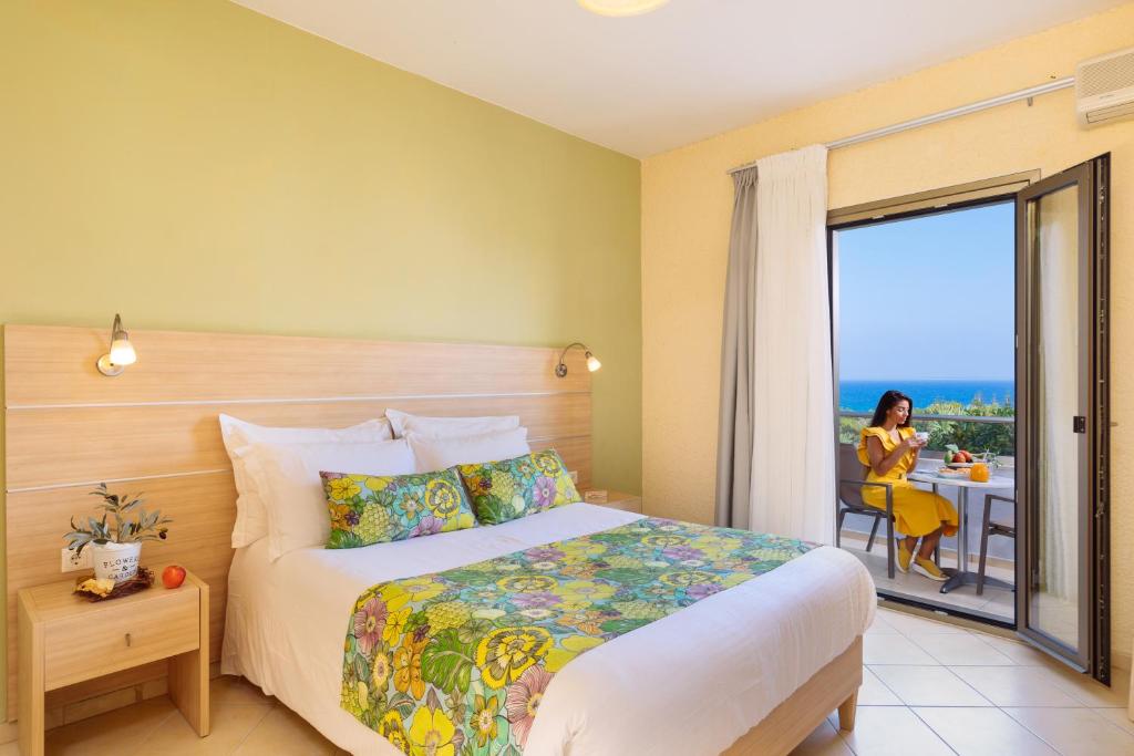 Postel nebo postele na pokoji v ubytování Oasis Scaleta Hotel