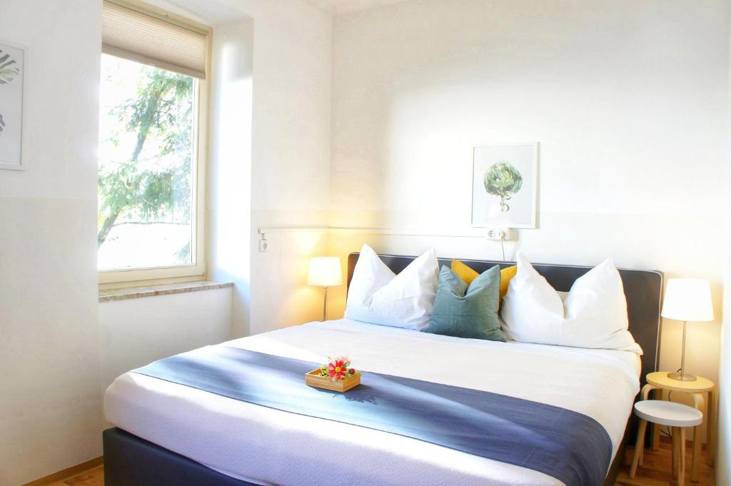 Posteľ alebo postele v izbe v ubytovaní Schwarzacherhof Pension & Apartments