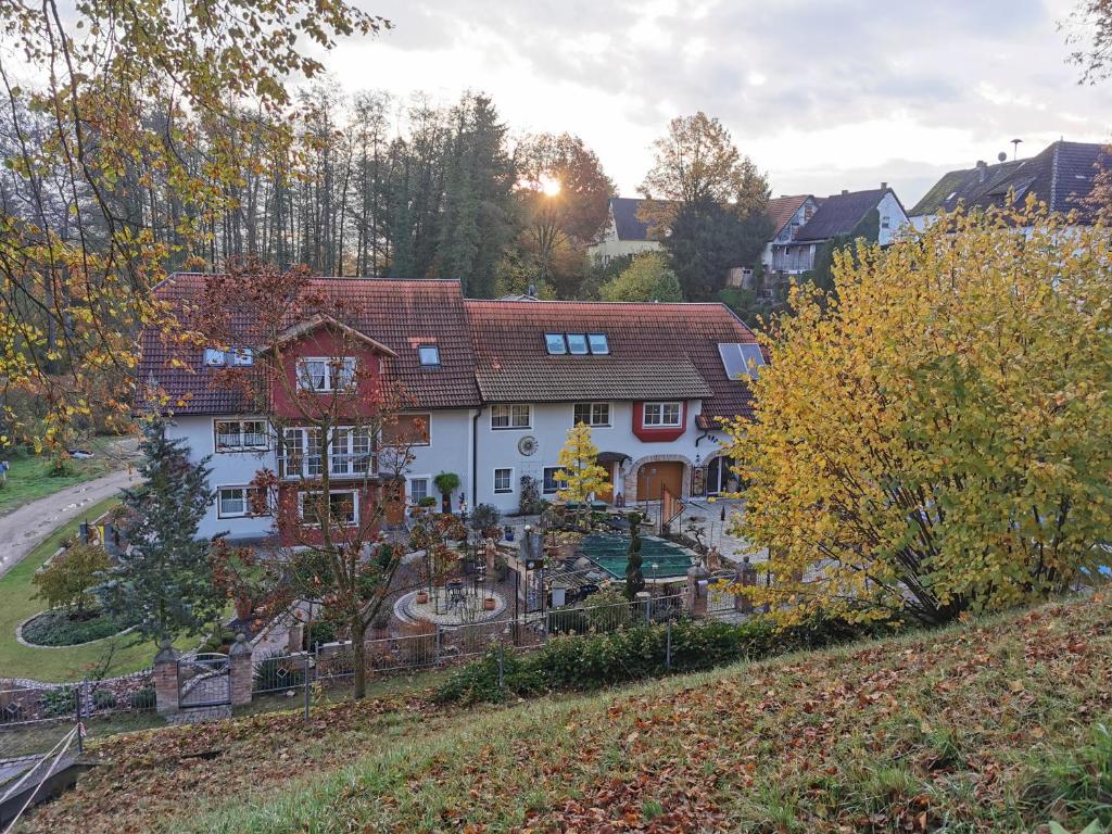 an aerial view of a large house at Gästezimmer Reitinger in Siegenburg