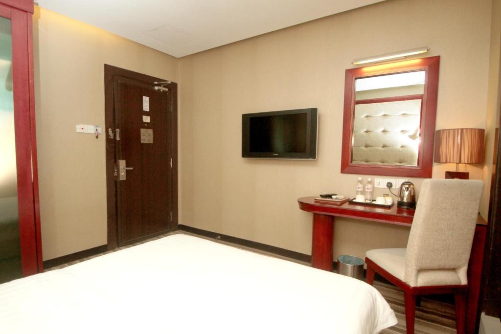 TV a/nebo společenská místnost v ubytování Celyn City Hotel