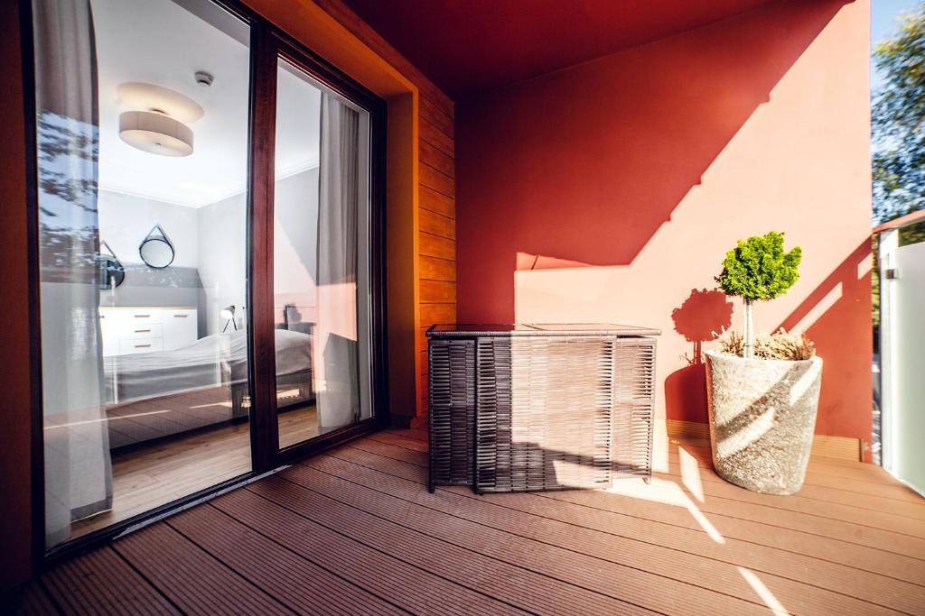 Balkón alebo terasa v ubytovaní FARO Apartamenty Polanki Park z basenami