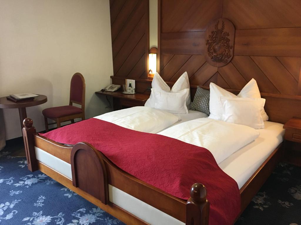 Postel nebo postele na pokoji v ubytování Hotel Tyrolis