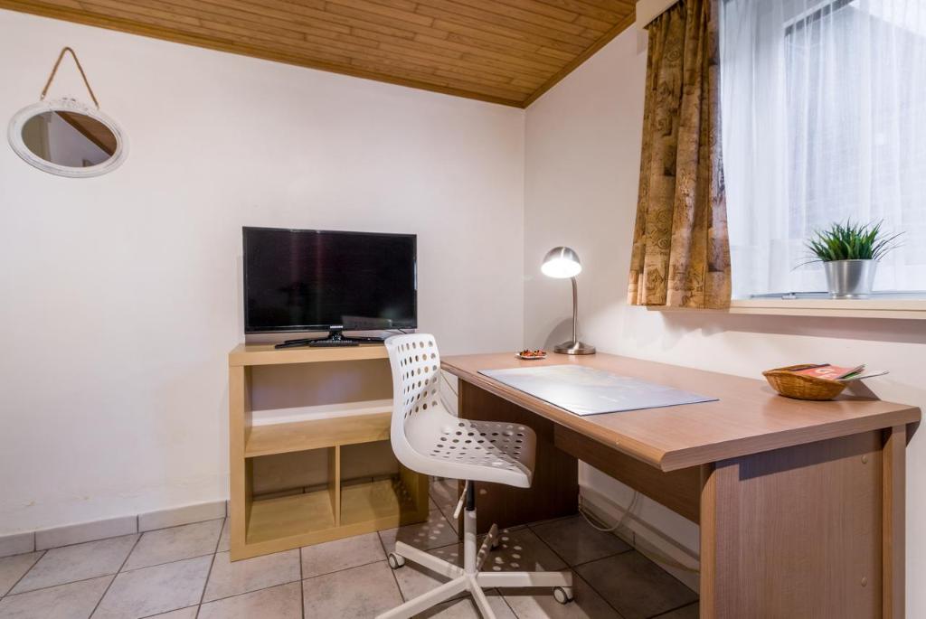TV a/nebo společenská místnost v ubytování Homestay Gent-Merelbeke self check-in service