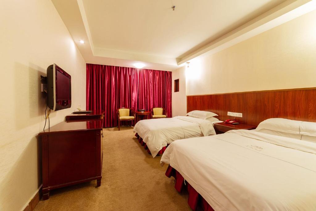 TV a/nebo společenská místnost v ubytování Guangzhou Junshan Hotel - Shuttle bus for Canton Fair