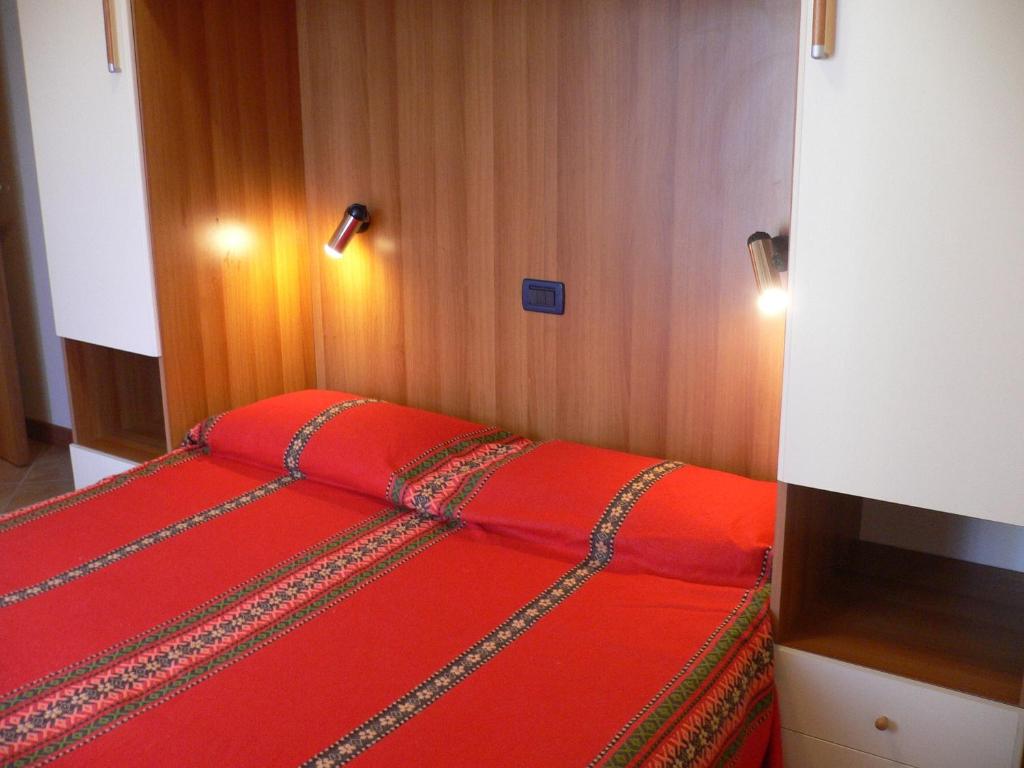 Postel nebo postele na pokoji v ubytování Milan Residence