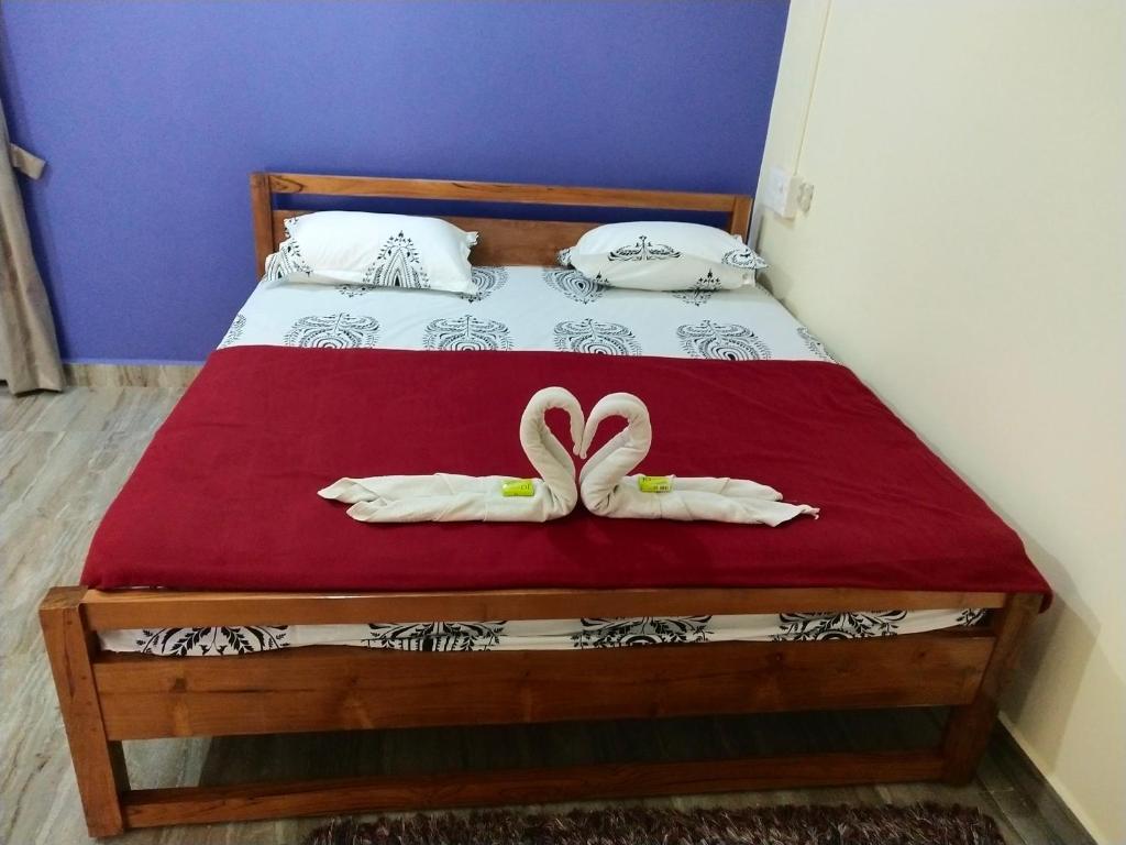 Postel nebo postele na pokoji v ubytování Hotel Rosary House