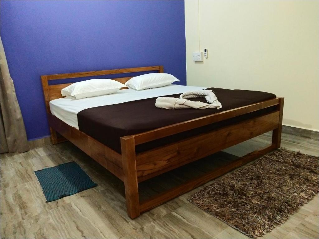 Postel nebo postele na pokoji v ubytování Hotel Rosary House