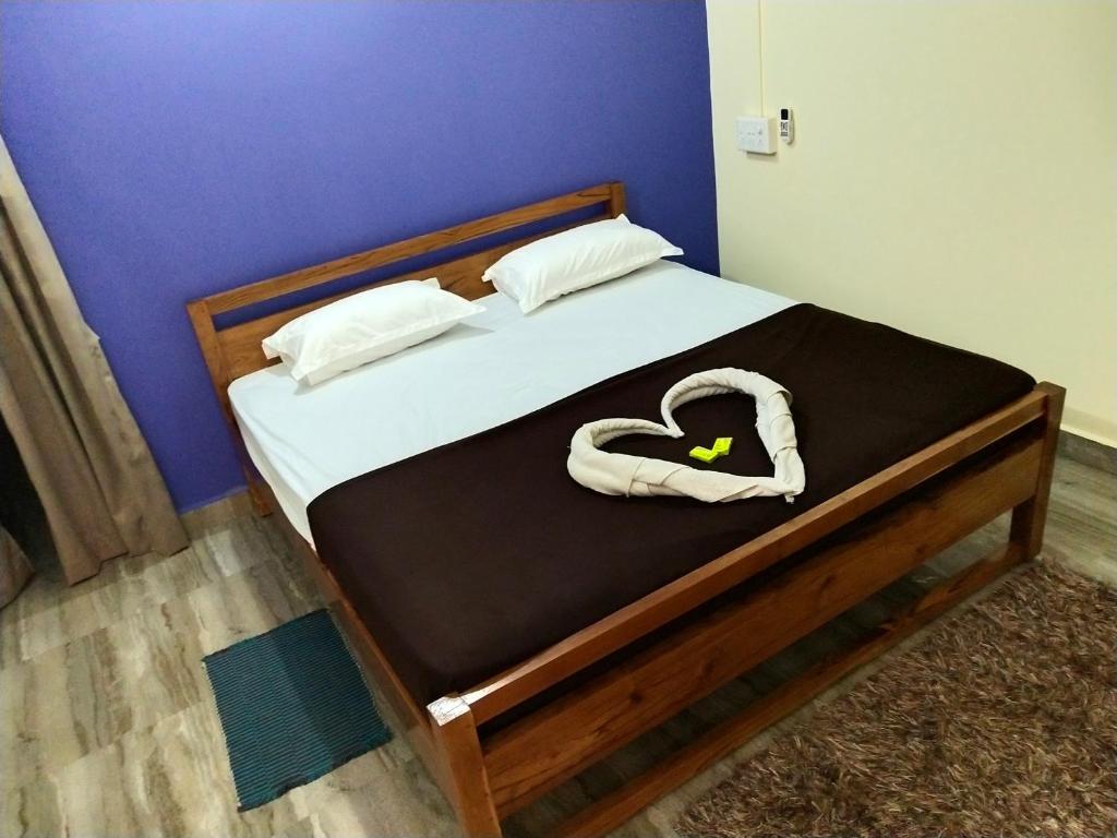 Postel nebo postele na pokoji v ubytování Hotel Rosary House