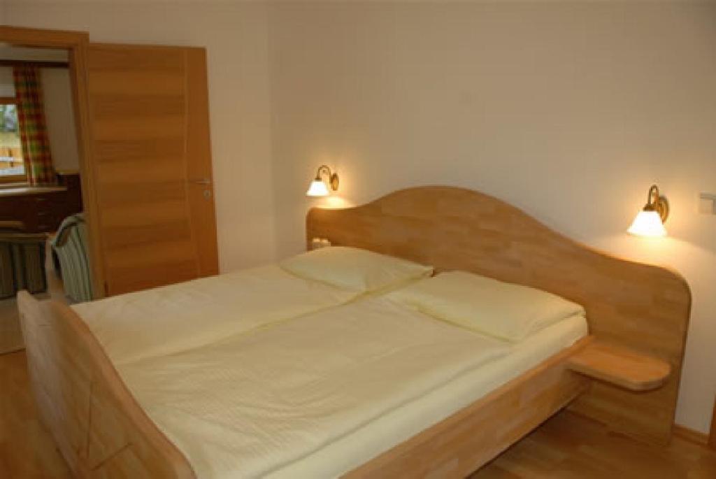 Postel nebo postele na pokoji v ubytování Appartement Aigner