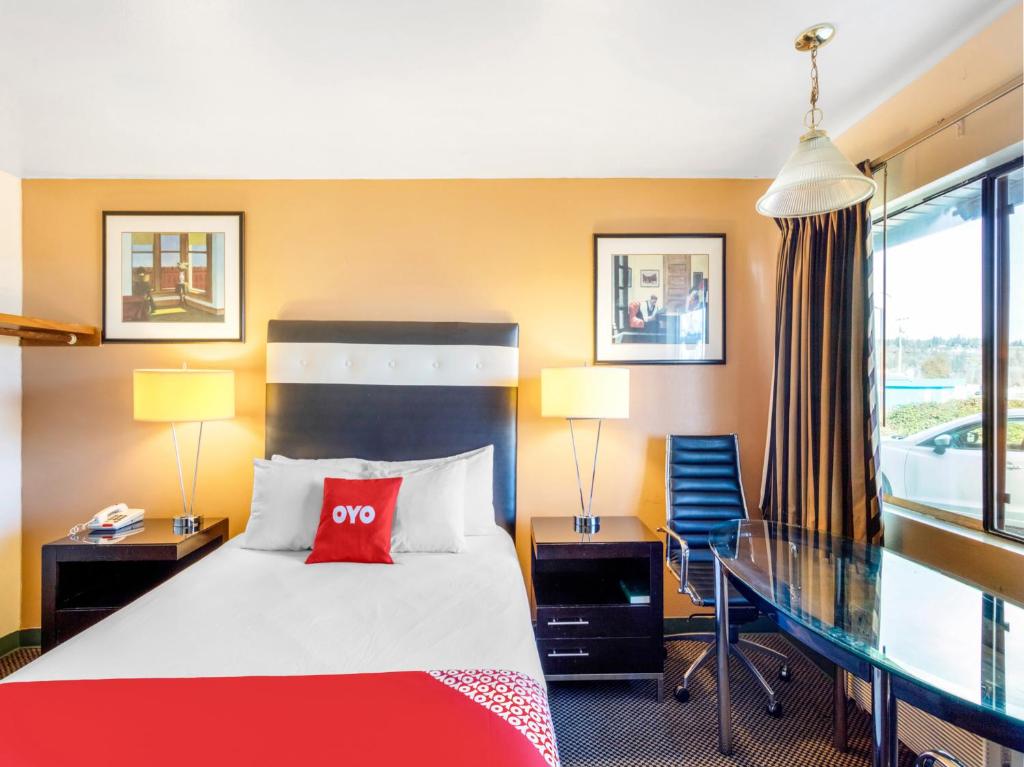 Ein Bett oder Betten in einem Zimmer der Unterkunft Arlington Motor Inn