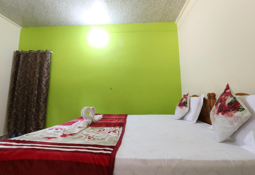 Postel nebo postele na pokoji v ubytování Hotel Rosary House