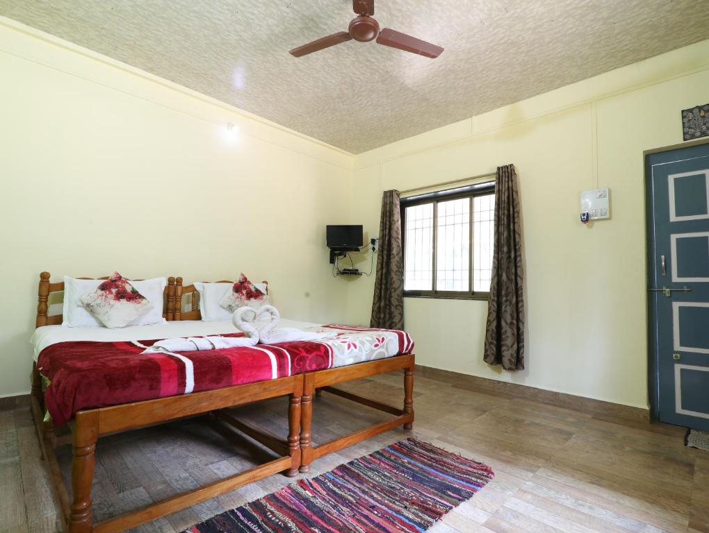 Postel nebo postele na pokoji v ubytování Hotel Rosary House