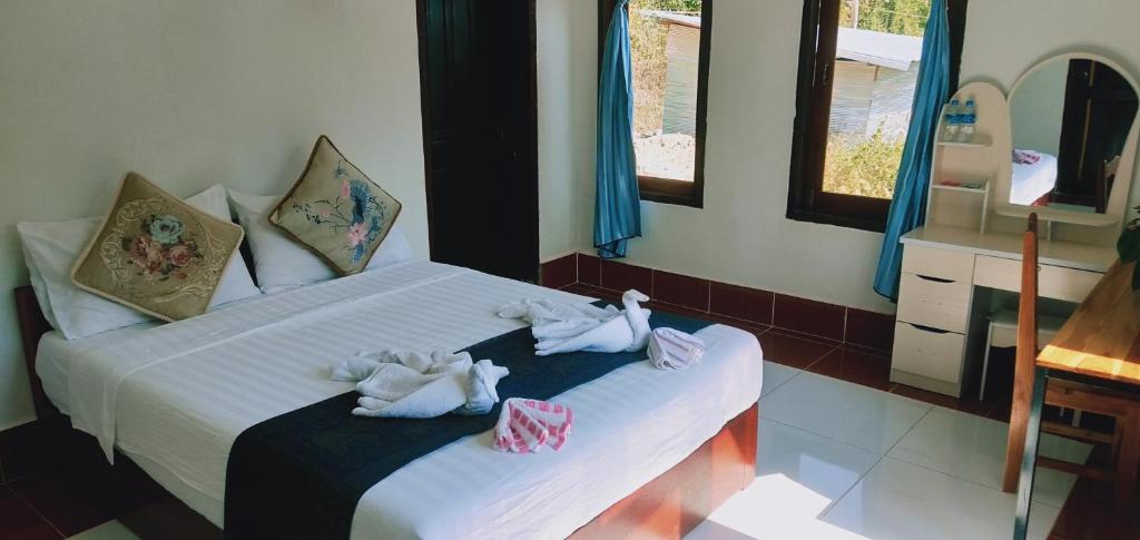 Villa Mekong Guesthouseにあるベッド