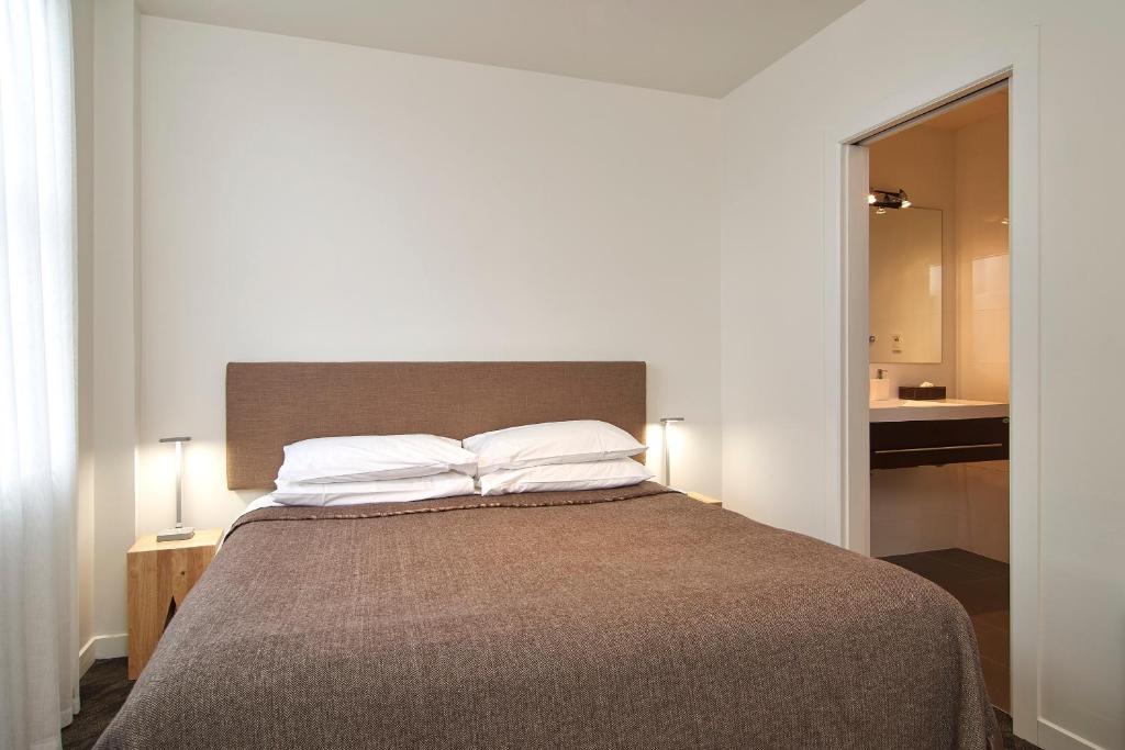 Postel nebo postele na pokoji v ubytování Hotel Carlton Mill