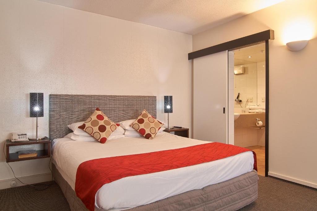 Postel nebo postele na pokoji v ubytování Hotel Carlton Mill