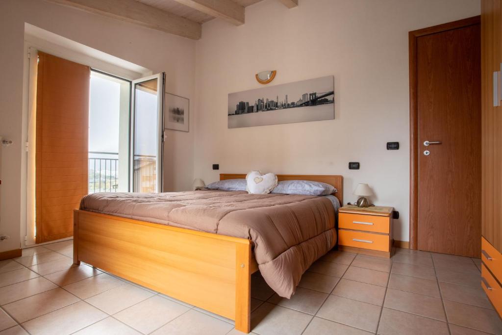 Кровать или кровати в номере Casa Vacanze Valeria