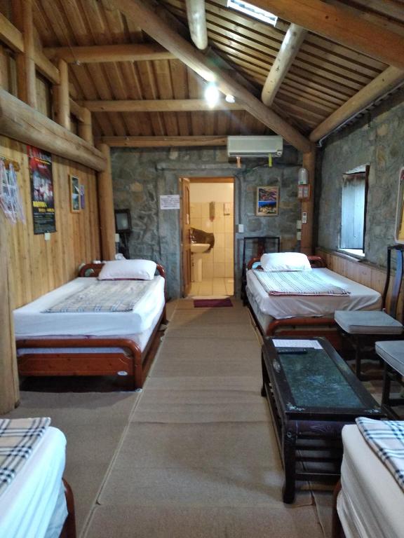 Postel nebo postele na pokoji v ubytování Chin -Be Village Cafe & Homestay