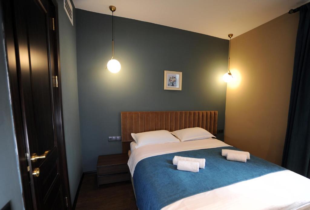 Postel nebo postele na pokoji v ubytování Hotel Verisima