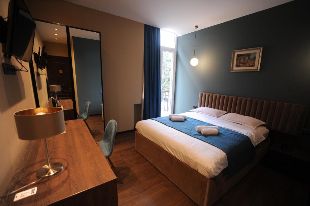 Postel nebo postele na pokoji v ubytování Hotel Verisima