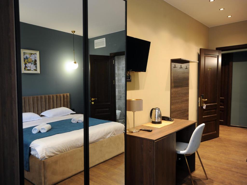 Postel nebo postele na pokoji v ubytování Hotel Verisima