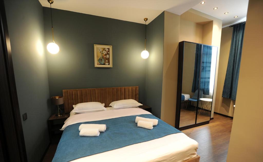 Postel nebo postele na pokoji v ubytování Hotel Verisima