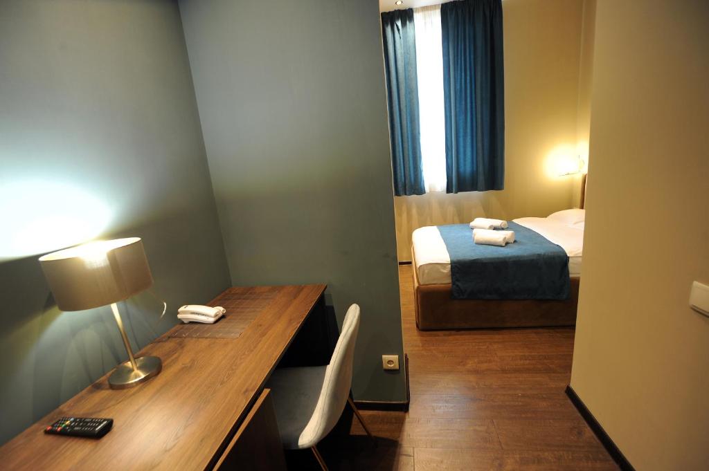 Postel nebo postele na pokoji v ubytování Hotel Verisima
