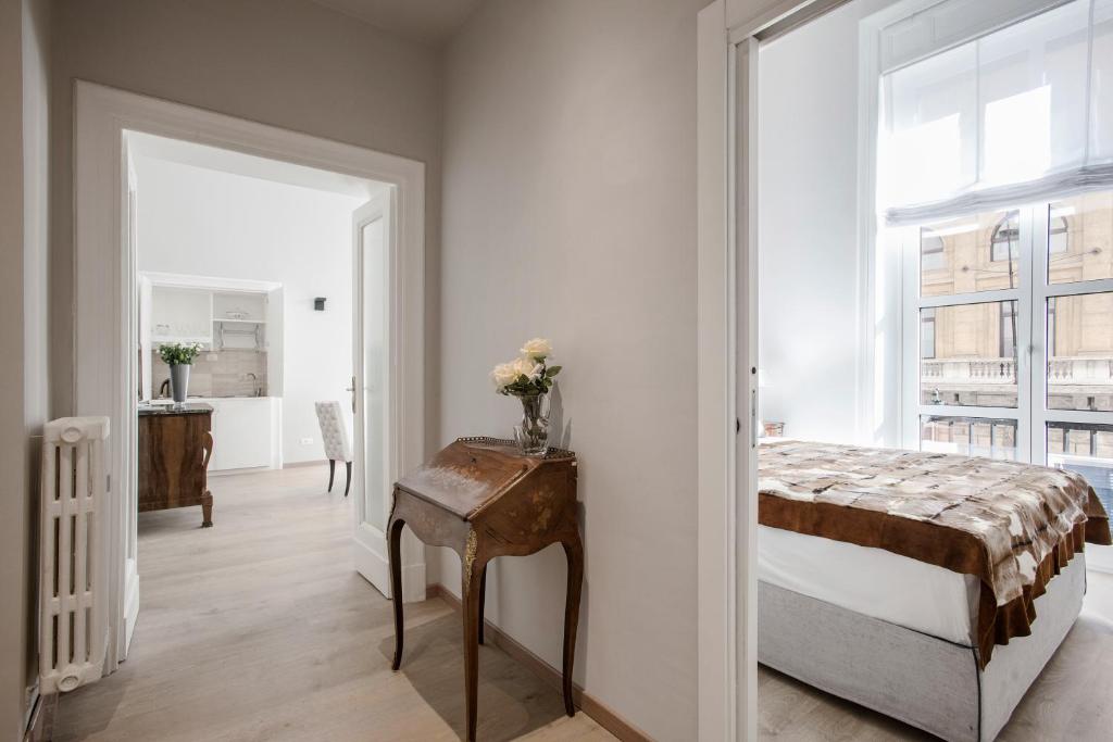 Posteľ alebo postele v izbe v ubytovaní SPA Apartment Via Barberini
