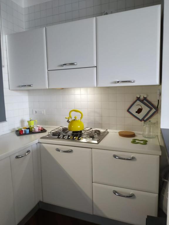Kuchyň nebo kuchyňský kout v ubytování Michi's Home - Attico in Centro