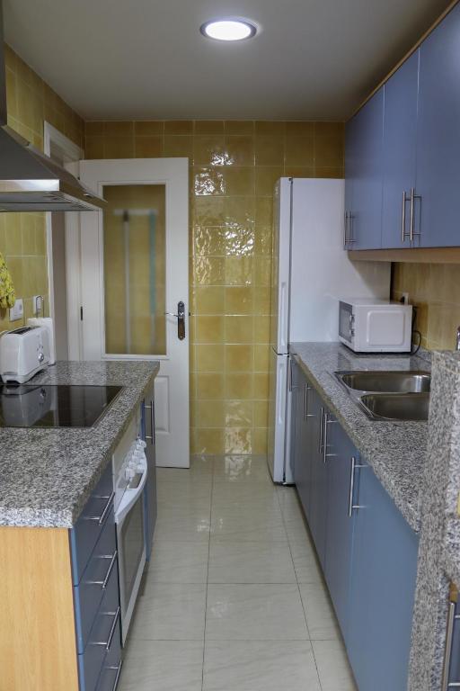 Kuchyň nebo kuchyňský kout v ubytování Residencial Mediterráneo