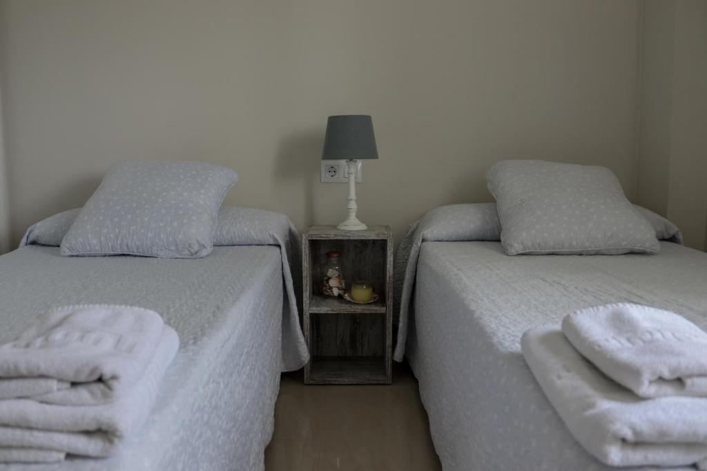 Postel nebo postele na pokoji v ubytování Residencial Mediterráneo