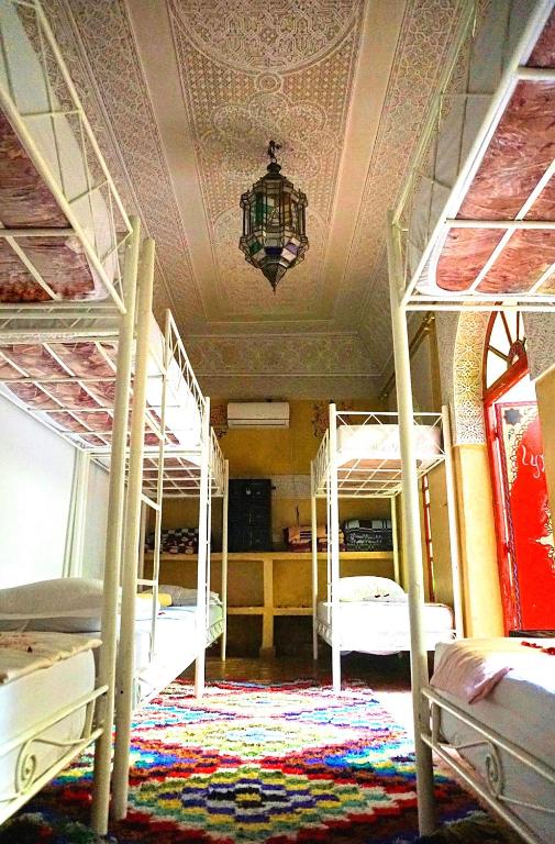 Postel nebo postele na pokoji v ubytování Riad Dia