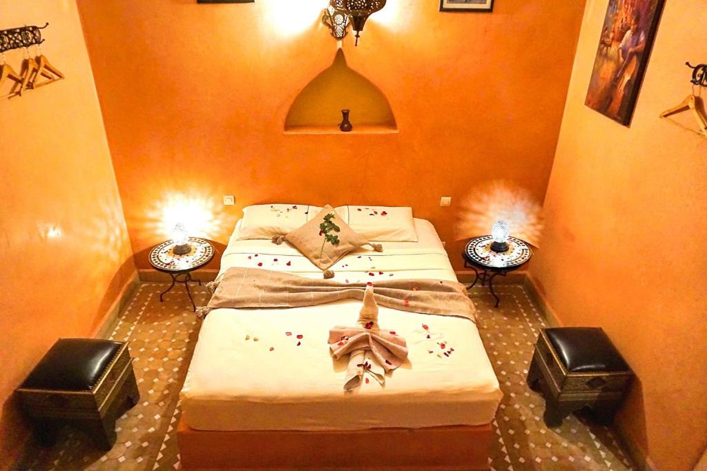 Postel nebo postele na pokoji v ubytování Riad Layla Rouge