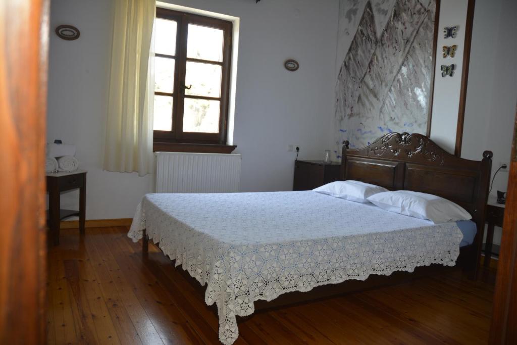 Postel nebo postele na pokoji v ubytování Hotel Adam