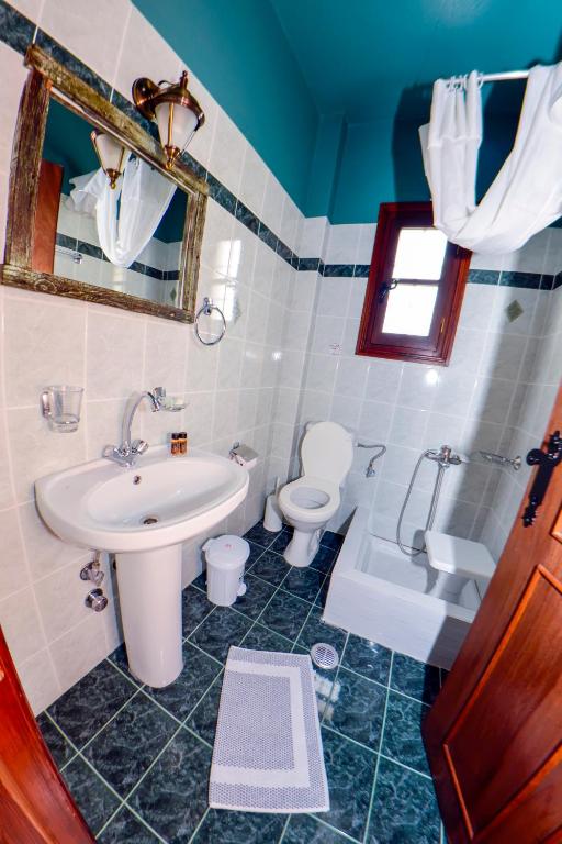 Koupelna v ubytování Hotel Adam