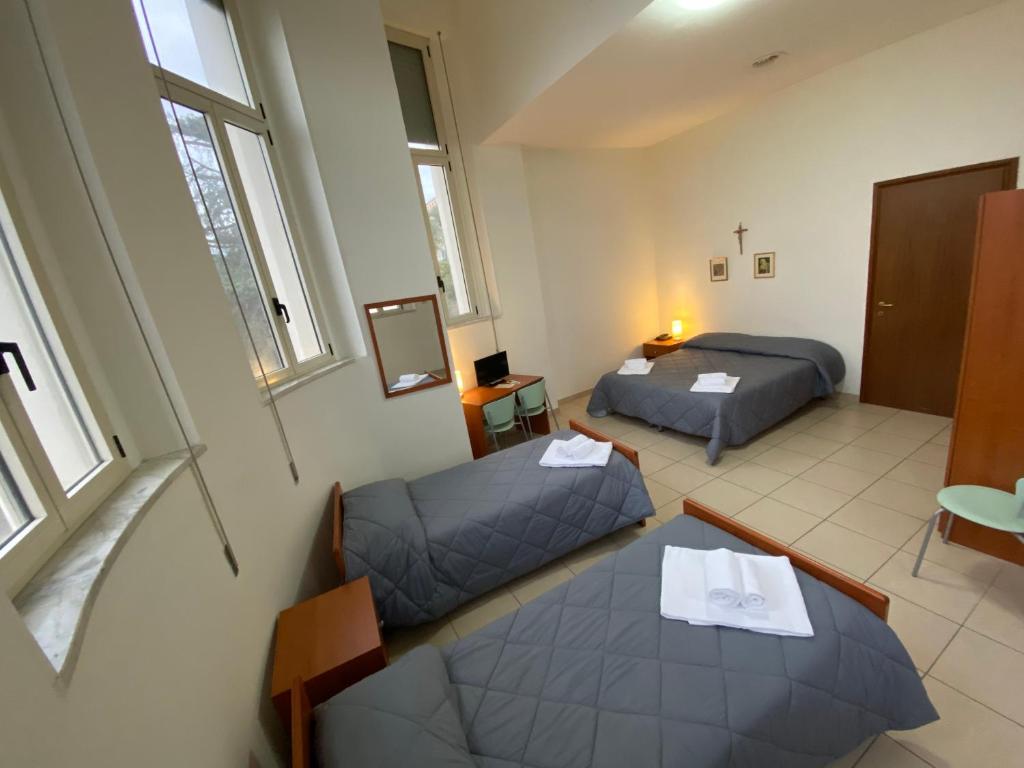 Letto o letti in una camera di Casa per Ferie Sant'Anna
