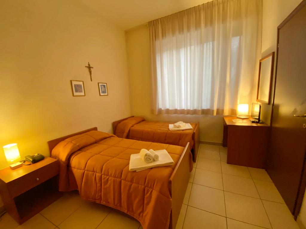 Letto o letti in una camera di Casa per Ferie Sant'Anna
