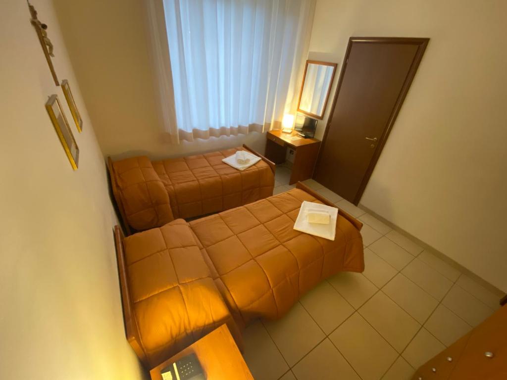 Letto o letti in una camera di Casa per Ferie Sant'Anna