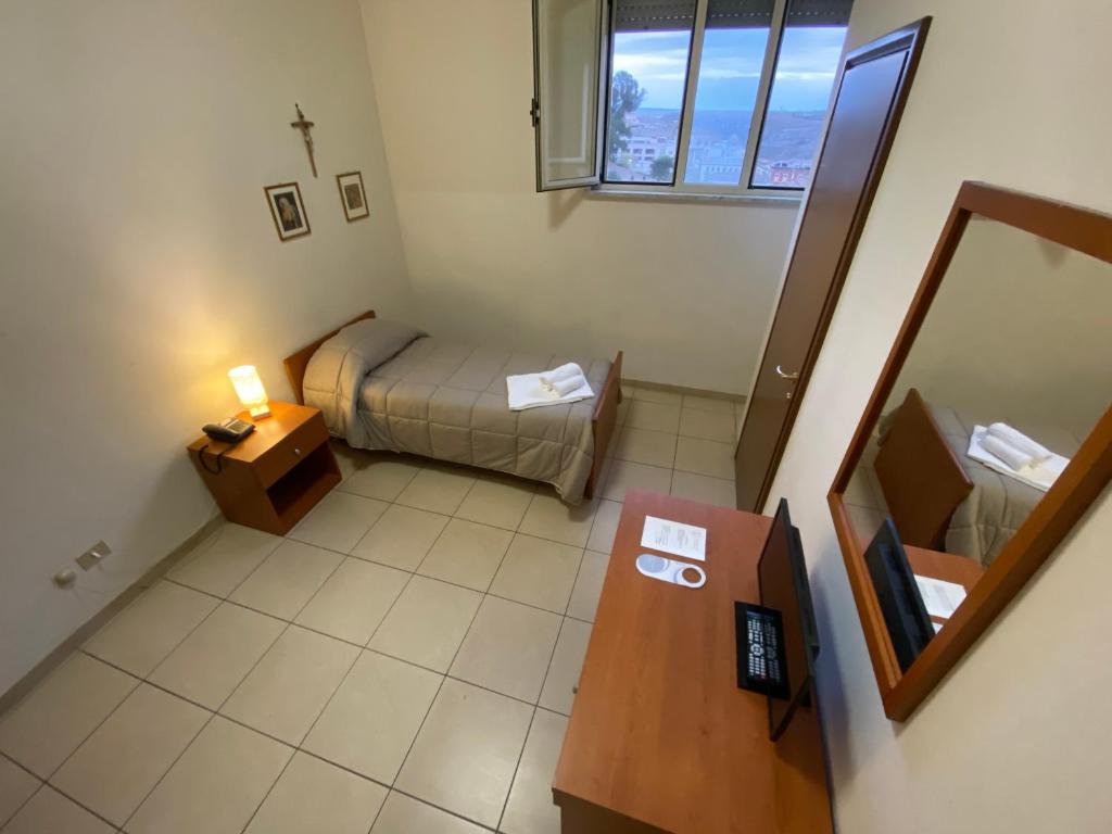 Letto o letti in una camera di Casa per Ferie Sant'Anna