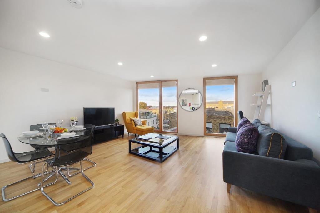 Posezení v ubytování 1 Bedroom Stylish Apartment near Regents Park FREE WIFI & AIRCON by City Stay Aparts London