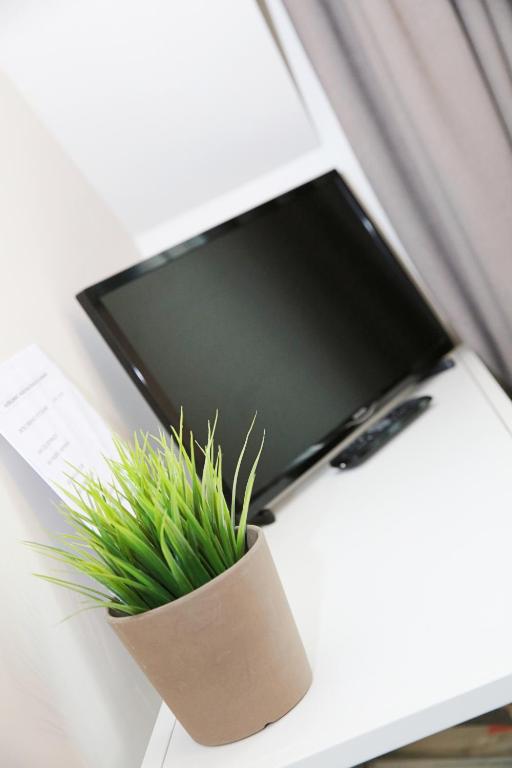 TV a/nebo společenská místnost v ubytování B&B Intermezzo