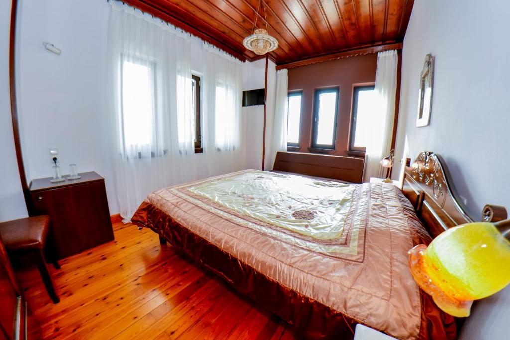 Postel nebo postele na pokoji v ubytování Hotel Adam