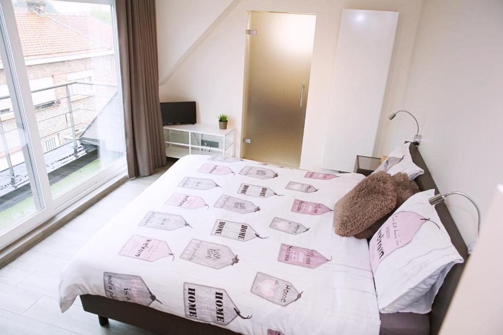 Postel nebo postele na pokoji v ubytování B&B Intermezzo