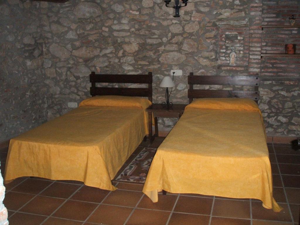 Postel nebo postele na pokoji v ubytování Mas CostaBravaSi