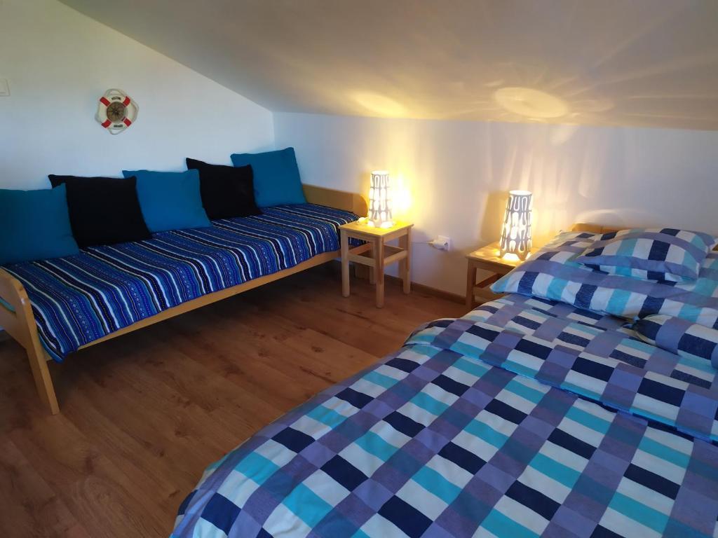 Postel nebo postele na pokoji v ubytování Pension Skalka