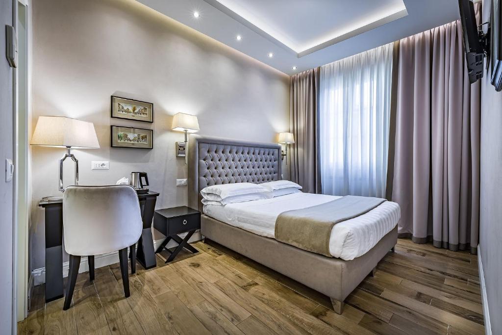Postel nebo postele na pokoji v ubytování Hotel Emma Small Luxury Hotel