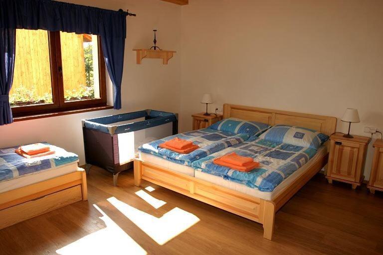 Postel nebo postele na pokoji v ubytování Chalupa Bella