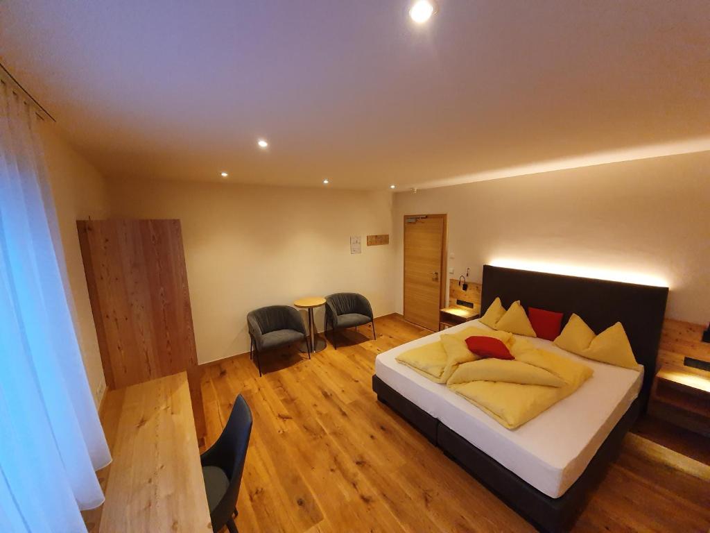 Voodi või voodid majutusasutuse Hotel Mignon toas