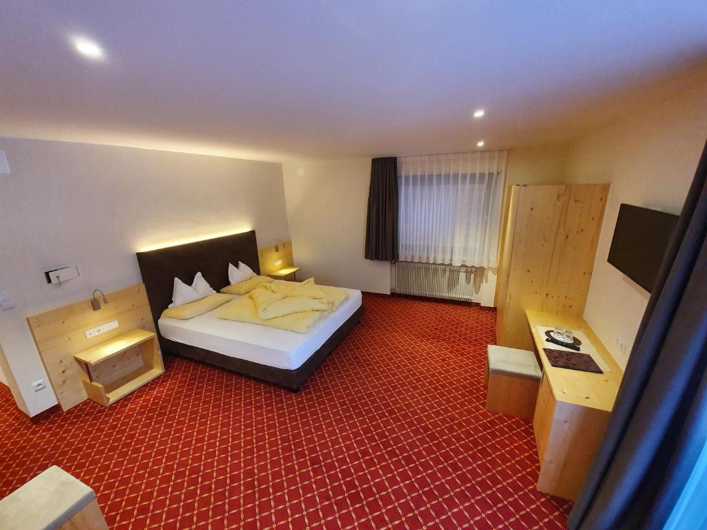 Voodi või voodid majutusasutuse Hotel Mignon toas