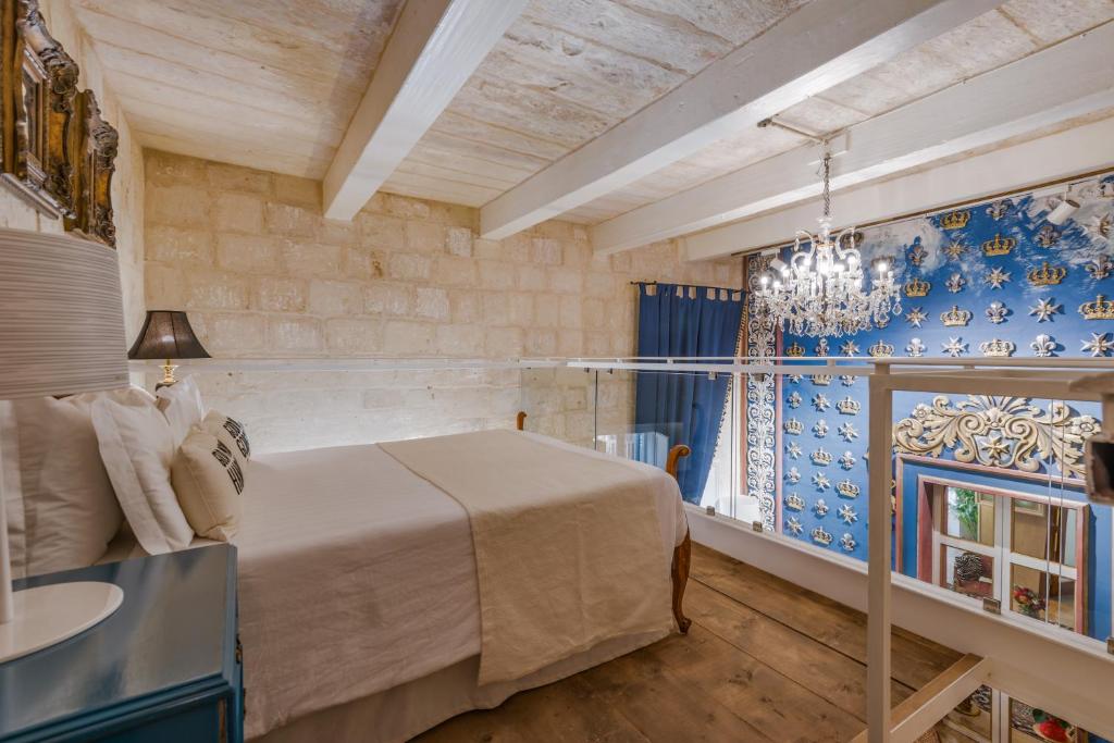 Postel nebo postele na pokoji v ubytování Valletta Lucente Guest House