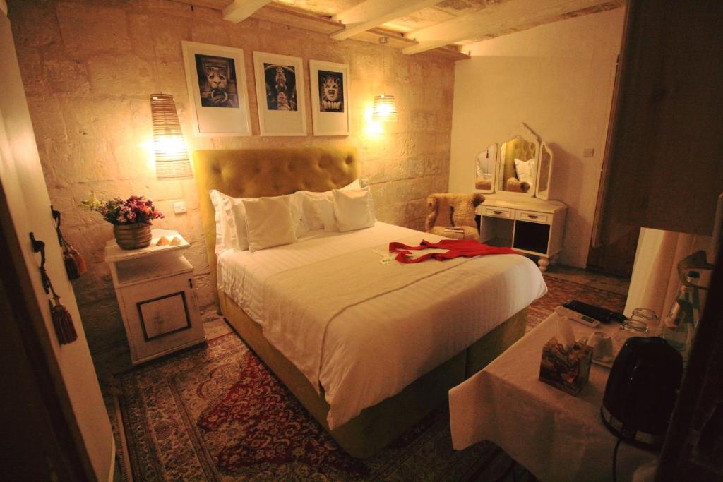 Postel nebo postele na pokoji v ubytování Valletta Lucente Guest House